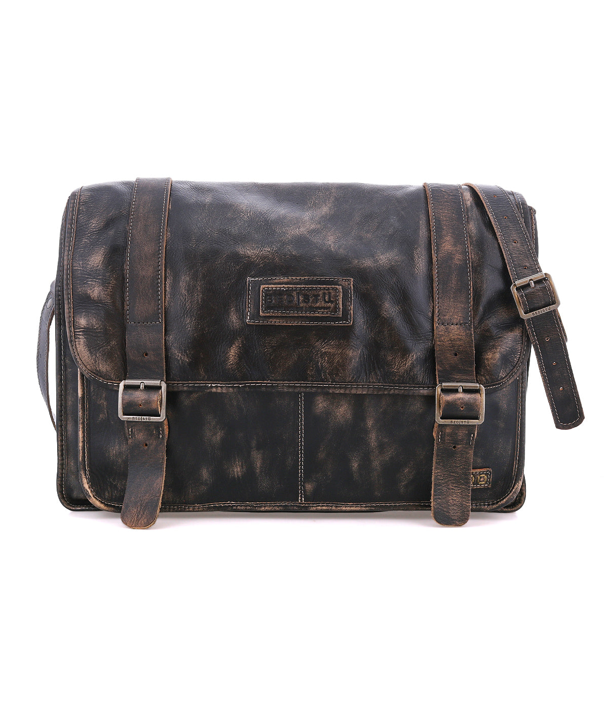 The Bed|Stü Wexler is a spacious, distressed leather messenger bag featuring two buckled straps, a top flap, and an adjustable shoulder strap.