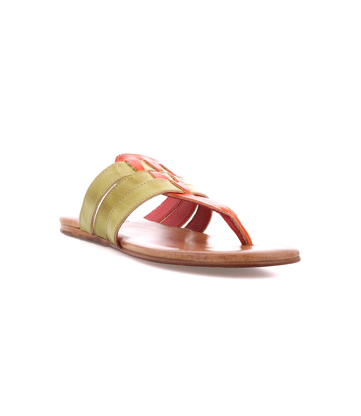 The Yoli sandal by Bed Stu combines a flat brown sole with green and orange crisscross straps and an open toe design. Its Aztec woven leather detail offers a unique touch, ideal for summer adventures.