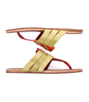 The Yoli sandals from Bed Stu feature brown leather soles with vibrant yellow and red leather straps. Positioned artfully against a white background, these stylish sandals ensure comfort with their cushioned insoles.