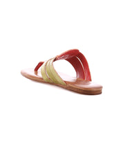 The Yoli by Bed Stu is a leather thong sandal with red and light green Aztec woven leather straps and a tan footbed, seen from the back.