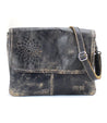 A stylish black leather Ziggy II crossbody bag by Bed Stu with a flower design and compartments.