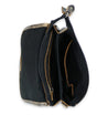 A stylish Ziggy II by Bed Stu black and gold leather crossbody purse with a zipper and compartments.
