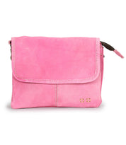 The Bed Stu Ziggy is a pink suede leather crossbody bag with a front flap, visible stitching, and gold square accents in the corner—perfect for carrying your daily essentials hands-free.
