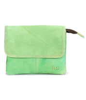 The Ziggy by Bed Stu is a small, rectangular, light green leather crossbody bag with a flap closure and two metal studs—an essential hands-free accessory for chic style, perfect as an alternative to a belt bag.