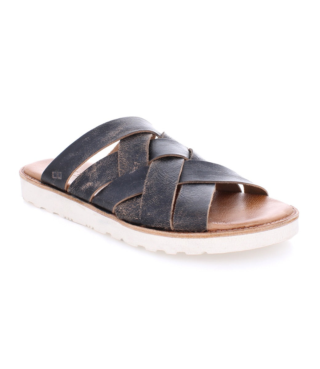 A single Abraham Light slide sandal with thick straps and a white sole, isolated on a white background. (Bed Stu)