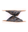 A pair of Abraham Light sandals with white soles by Bed Stu.