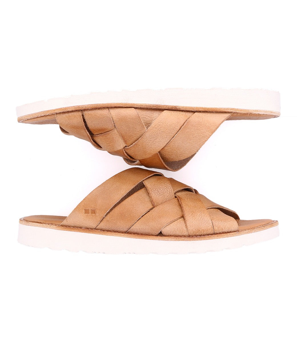 A pair of Bed Stu Abraham Light leather woven slide sandals displayed against a white background.
