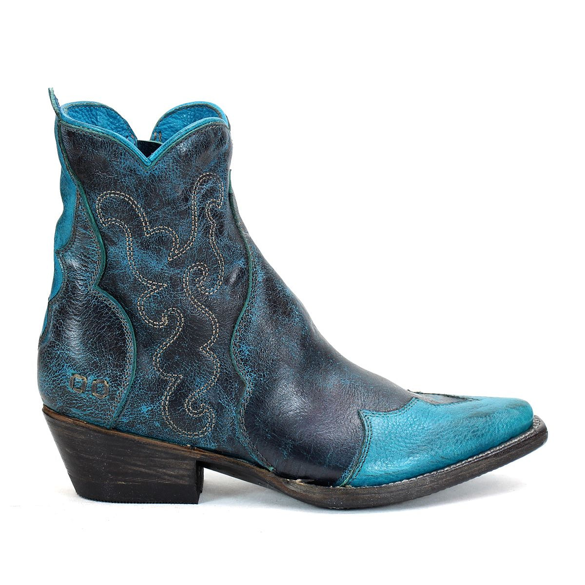 The Ace by Bed Stu is a blue and black leather ankle cowgirl boot featuring decorative stitching, a low heel, and a durable stacked leather sole, exemplifying modern western style.