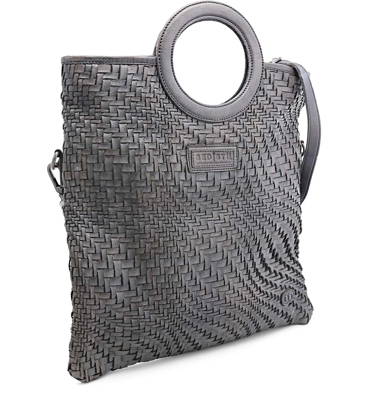 An Adele bag by Bed Stu, woven with a grey color and featuring a handle.
