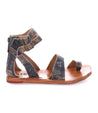 An Afrodita sandal by Bed Stu with two straps and a leather sole.