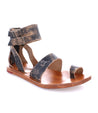 A women's black leather Afrodita sandal with two straps by Bed Stu.
