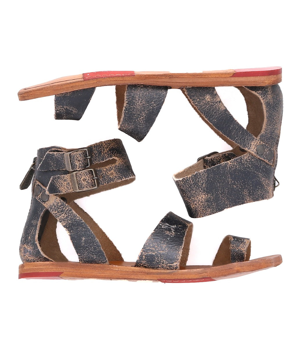 A pair of Bed Stu Afrodita sandals with straps and buckles.