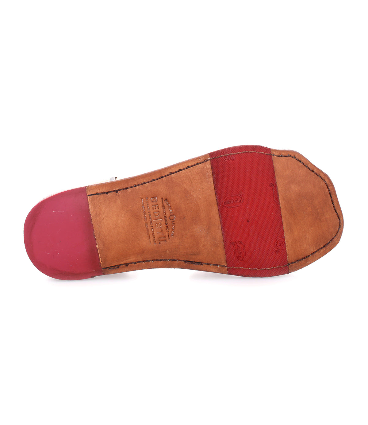 A pair of Afrodita shoes with red and tan soles by Bed Stu.