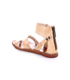 A pair of Bed Stu Afrodita women's sandals in tan.