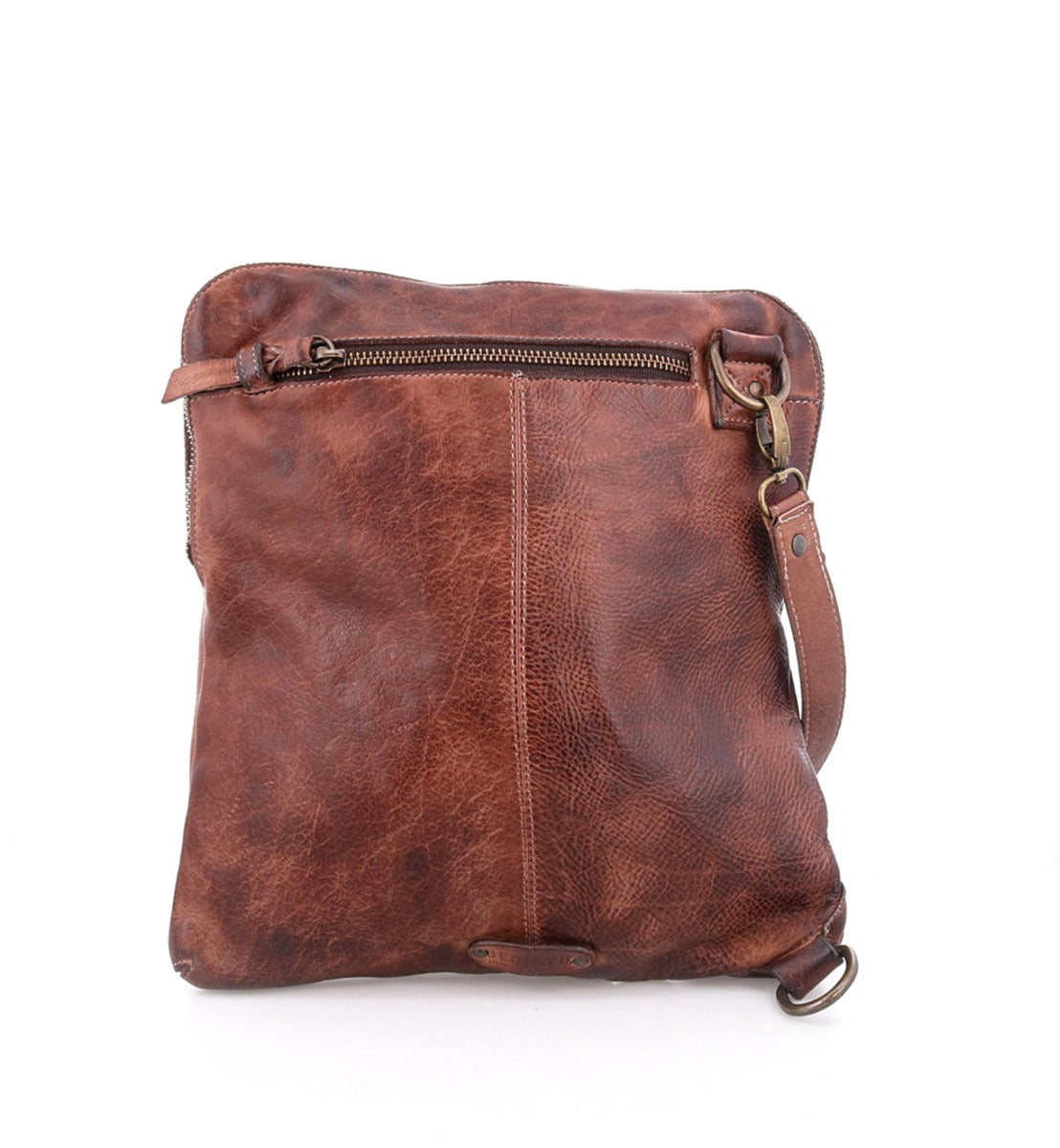 A Bed Stu Aiken brown leather crossbody bag with a zipper.