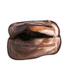 A Bed Stu brown leather toiletry bag with a zipper.