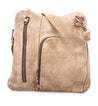 An Aiken tan leather crossbody bag with zippers by Bed Stu.