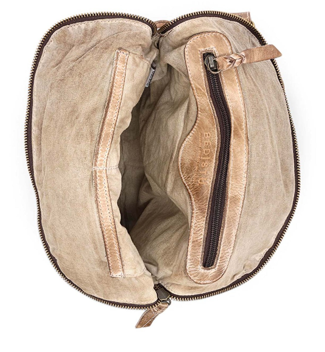 The inside of a Bed Stu tan bag with zippers.