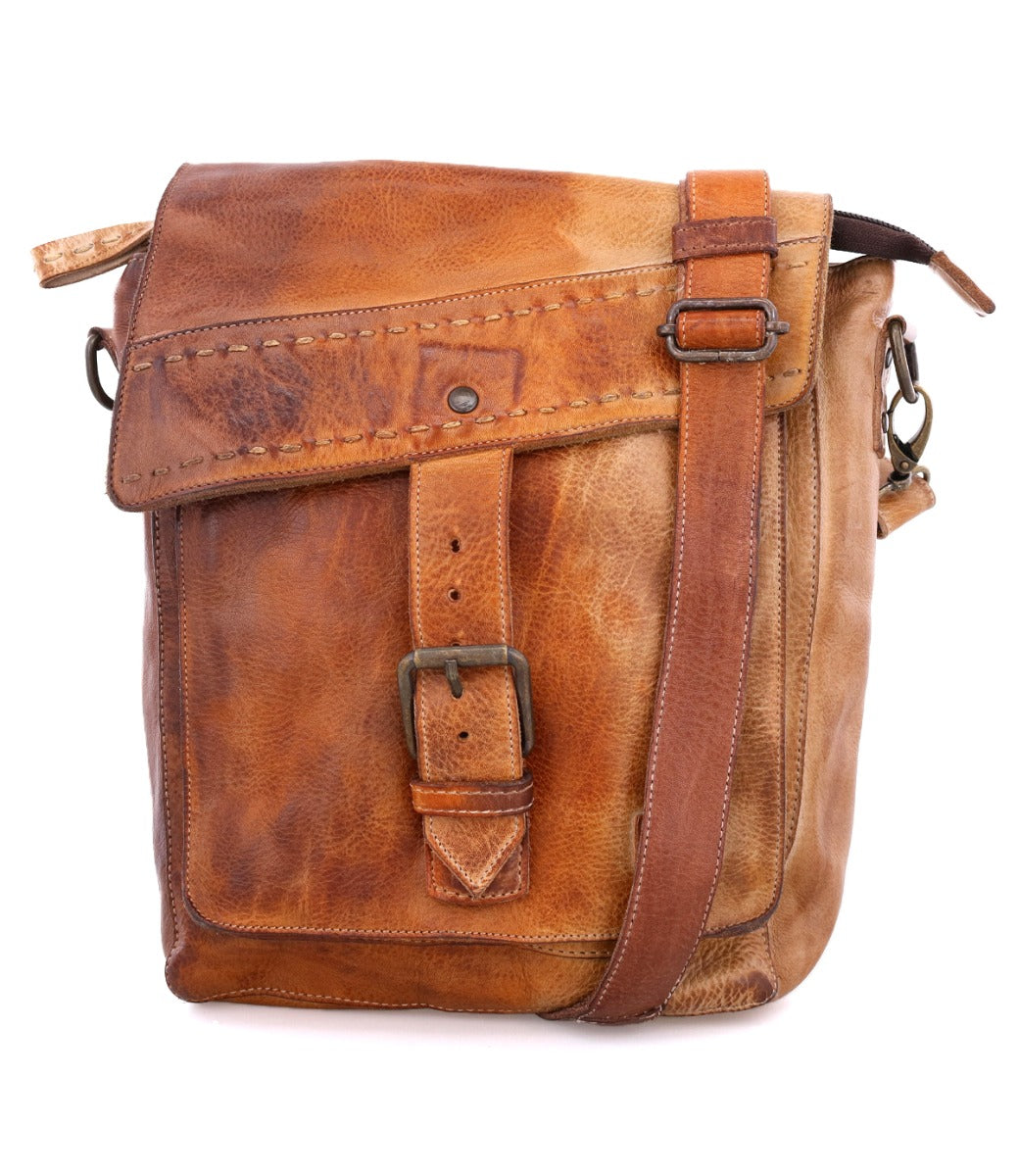 A Bed Stu Ainhoa brown leather crossbody handbag with an adjustable strap.