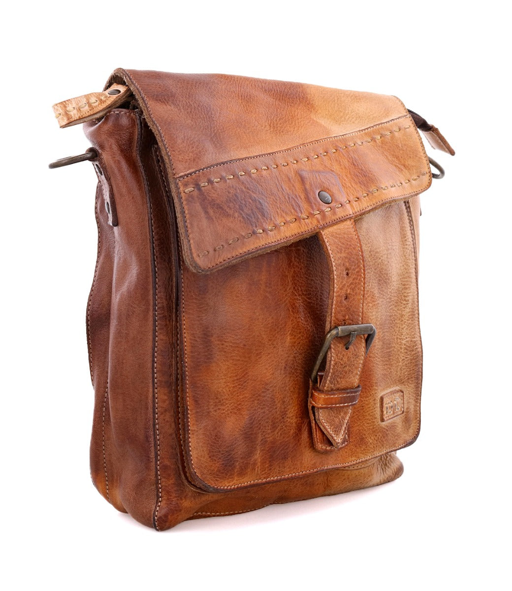 A brown leather crossbody handbag with adjustable strap, the Ainhoa by Bed Stu.