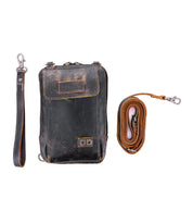 A premium Bed Stu black leather bag with a crossbody strap and lanyard.