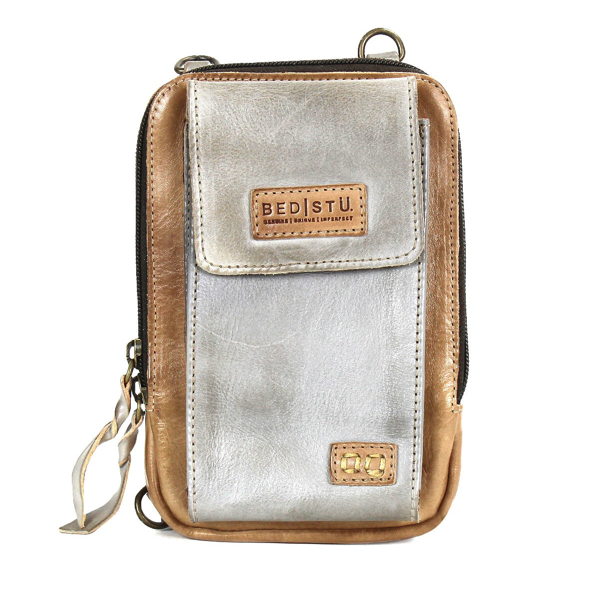 The Bed Stu Alelike is a compact two-tone leather crossbody phone holder featuring a front flap pocket, zip closure, and Bed Stu branding on the front.