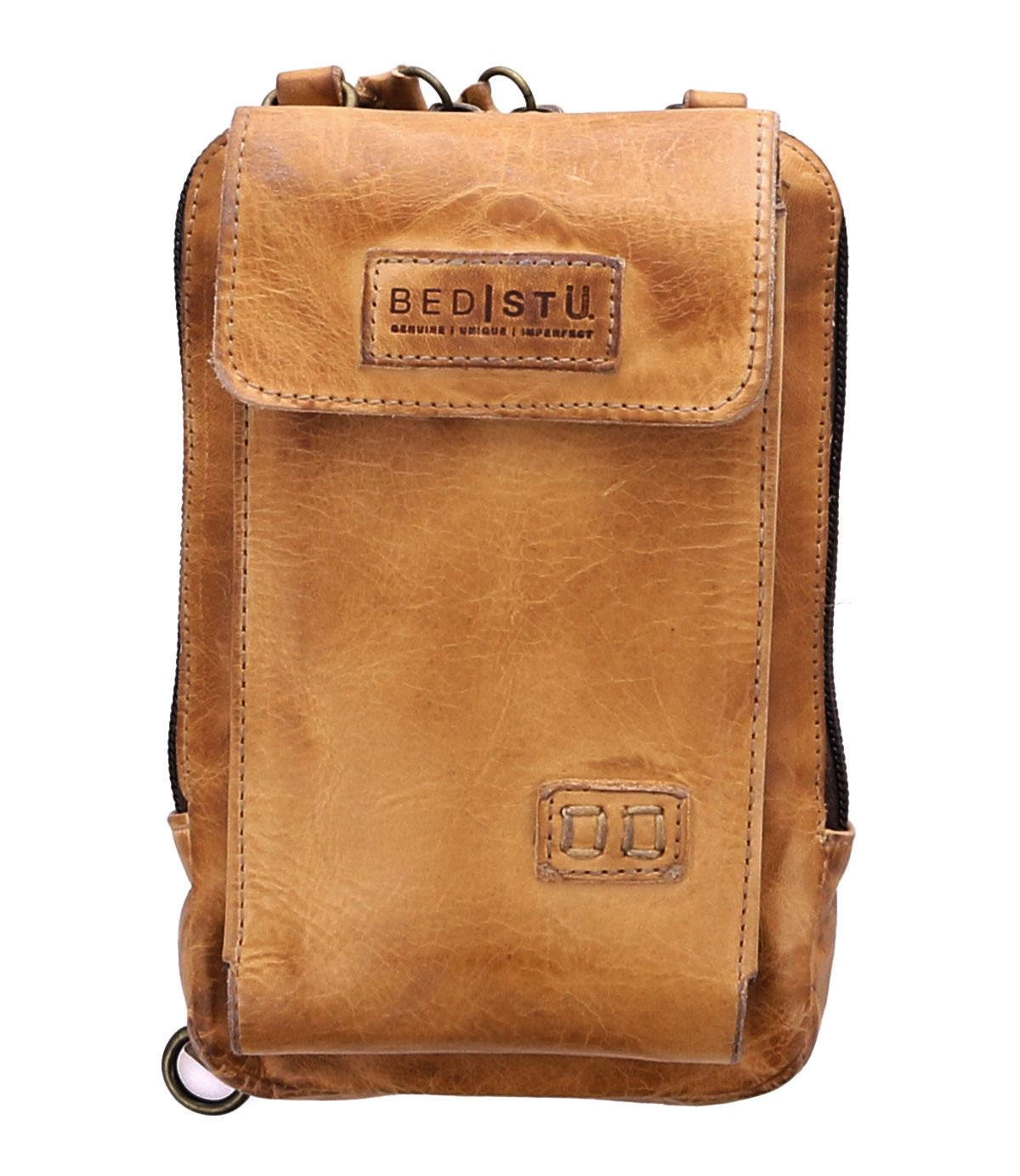 The &quot;Alelike&quot; by Bed Stu is a premium leather brown crossbody bag with a front flap and branded tag, featuring a metallic ring at the bottom. This stylish accessory also functions as a crossbody phone holder for daily use.