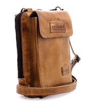 An Alelike brown premium leather crossbody bag from Bed Stu, featuring a flap closure, an adjustable strap, and the brand name visible on the front—an ideal mix of everyday functionality and style.
