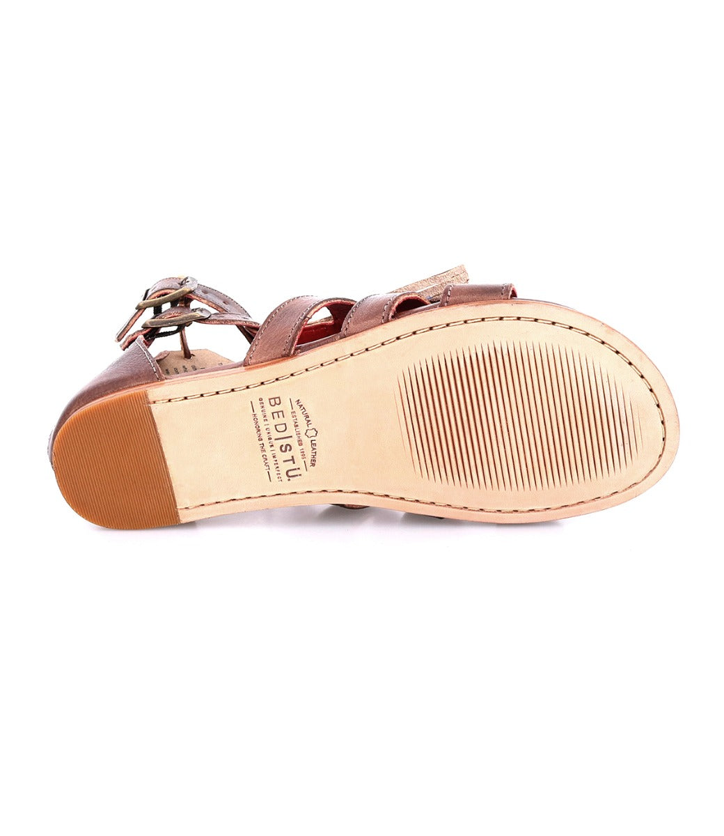 A pair of Bed Stu Alena women's sandals with straps and buckles.