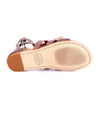 A pair of Bed Stu Alena women's sandals with straps and buckles.