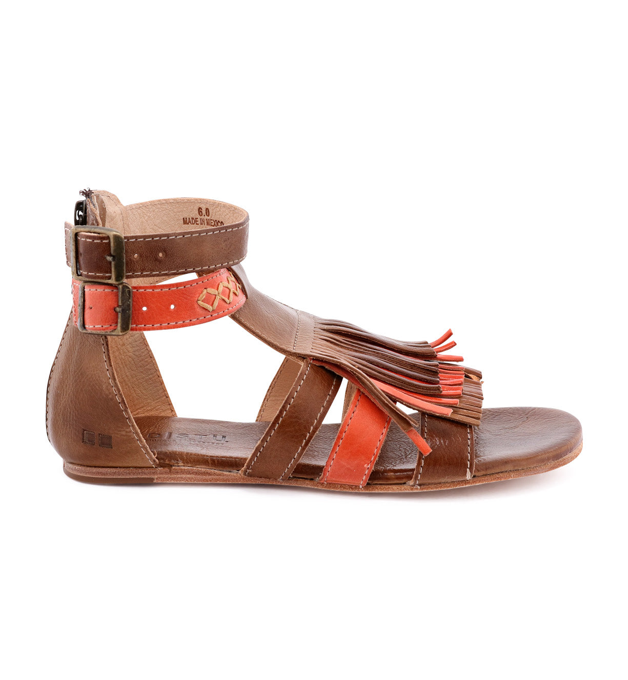 A women's brown and orange Alena sandal with fringes, made by Bed Stu.