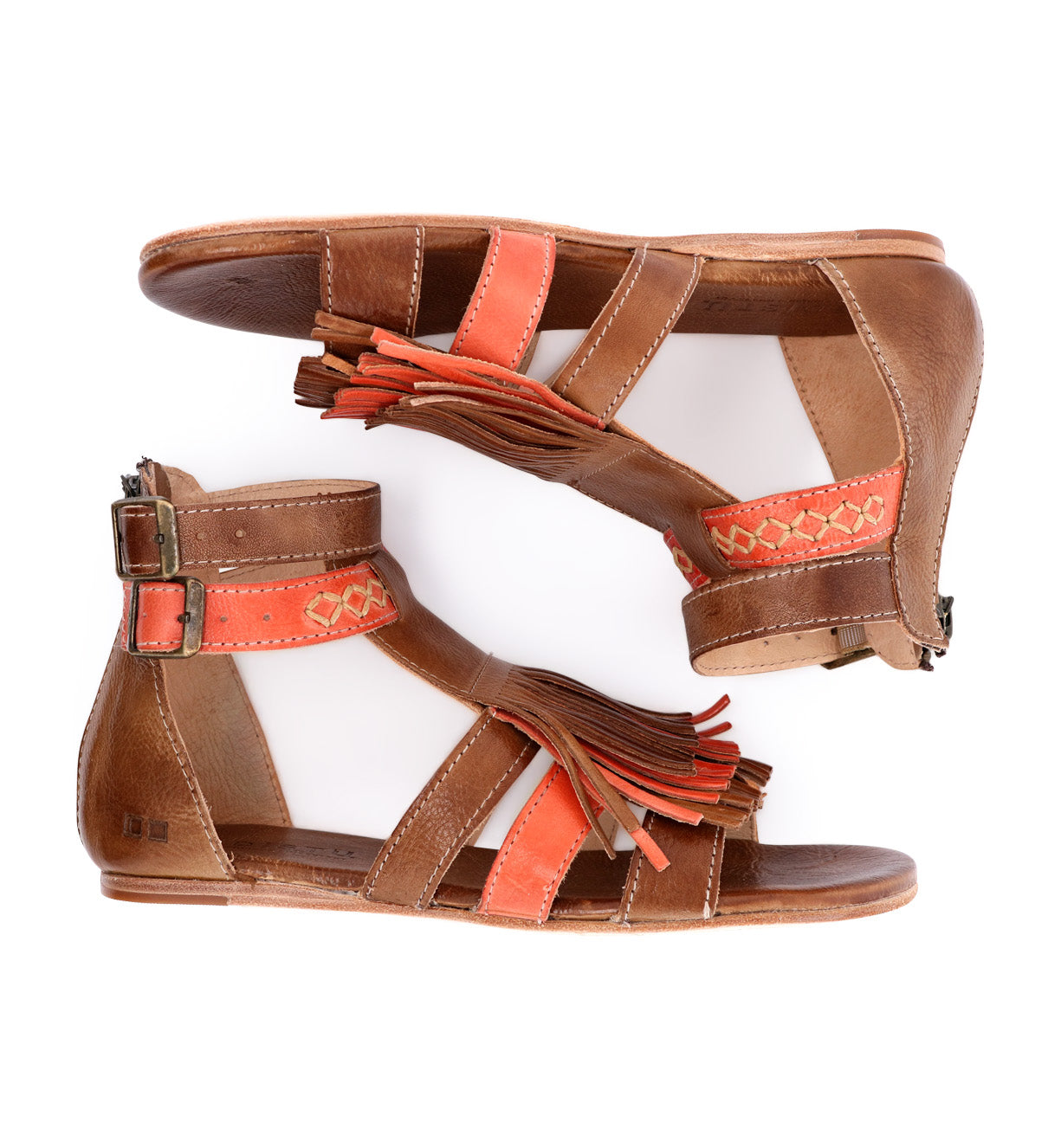 A pair of Alena sandals by Bed Stu, brown and orange with tassels.