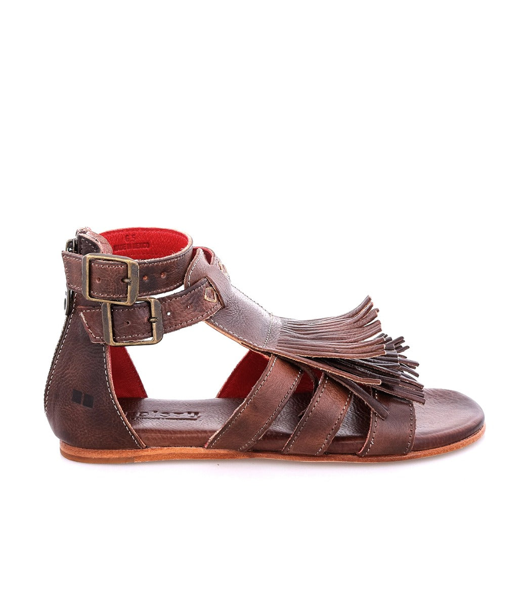 An Alena women's brown sandal with fringes and straps by Bed Stu.