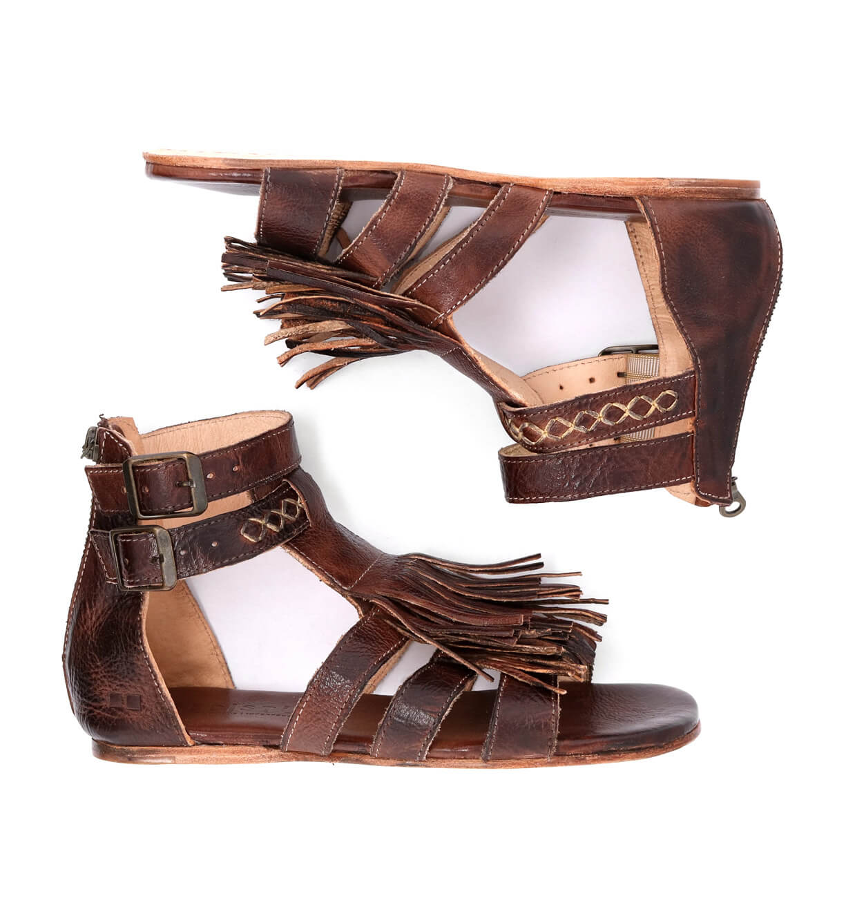 A pair of brown Bed Stu Alena gladiator sandals with fringes.