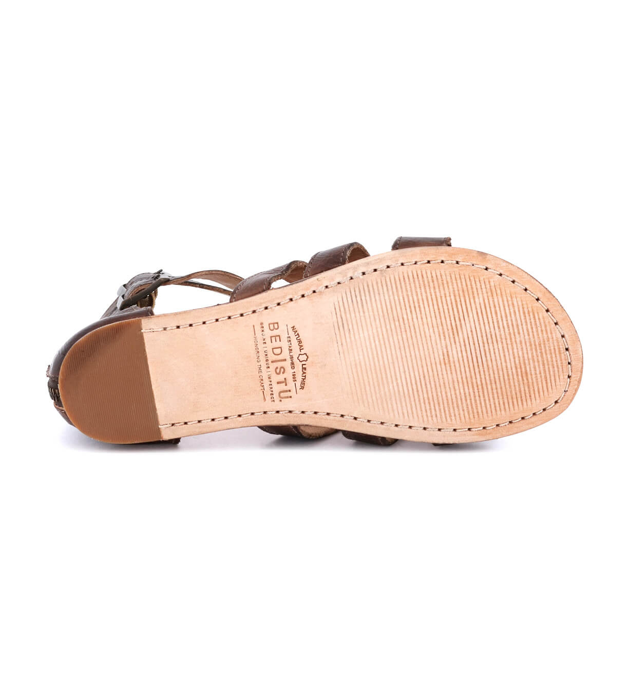 A pair of Bed Stu Alena brown sandals with straps and buckles.