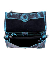 Top view of an open Amina by Bed Stu, a blue and black leather wallet with multiple compartments, including card slots, a zippered section, and a main compartment—perfect for use as a stylish clutch.