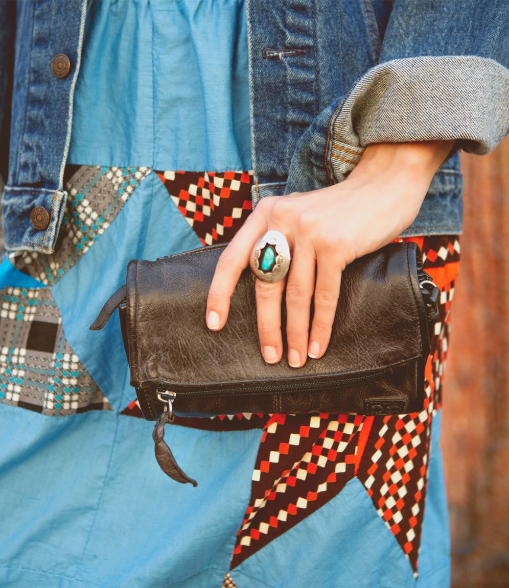 A woman holding a Amina purse by Bed Stu.