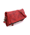 A Bed Stu Amina, a red leather cross body bag with a zipper.