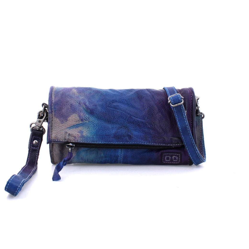 An Amina cross body bag with a strap in blue and purple by Bed Stu.