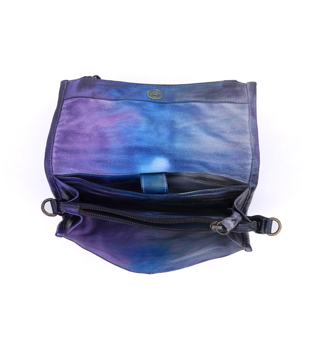 An Amina purse with a zipper, in blue and purple, made by Bed Stu.