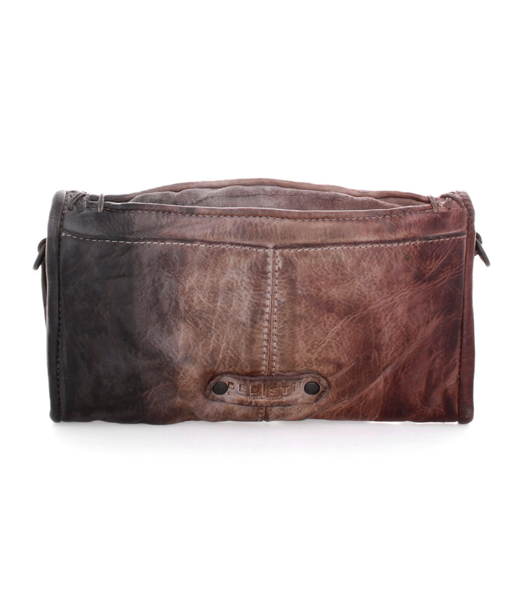 An image of an Amina bag by Bed Stu, made of brown leather, with a zipper.