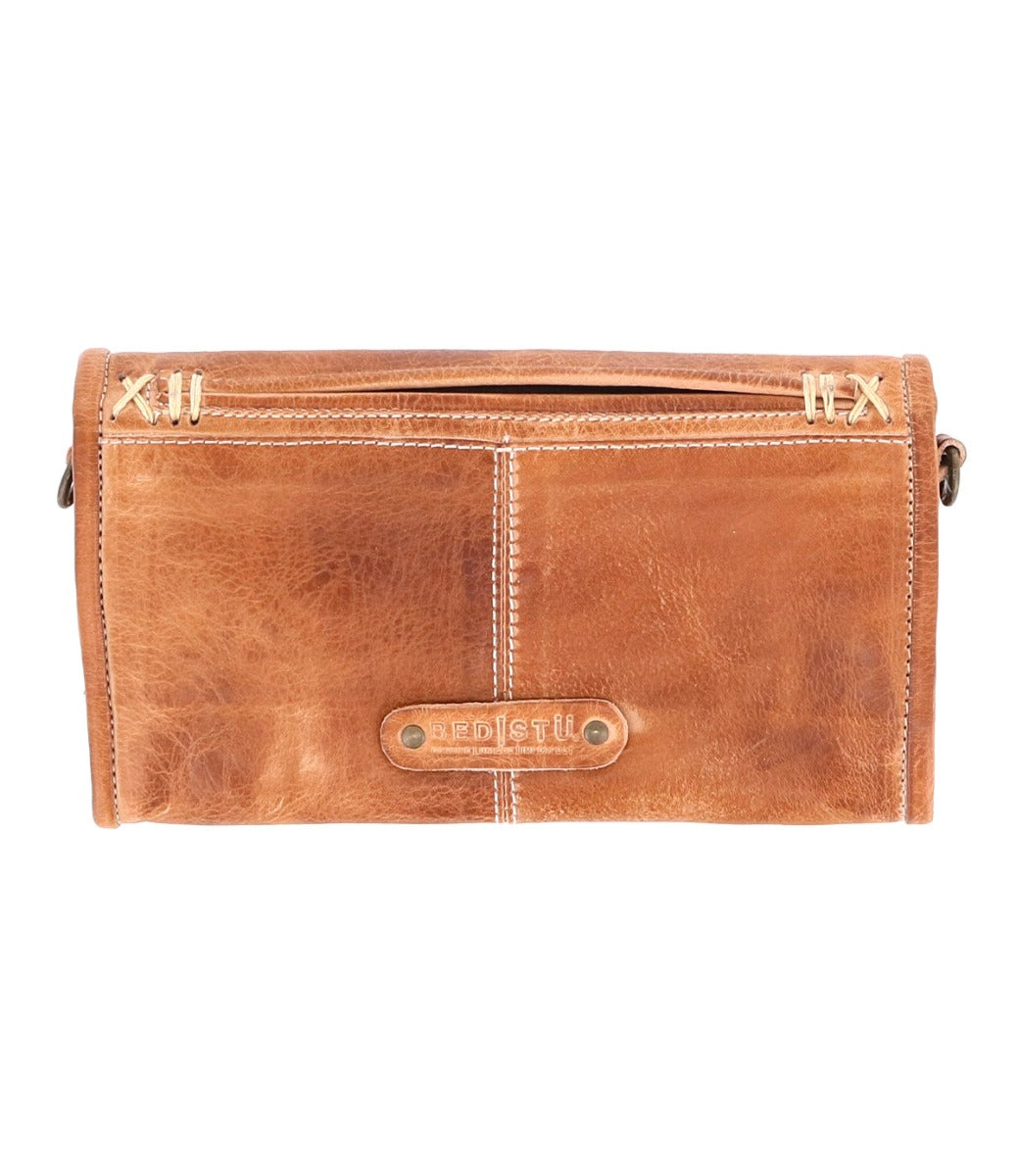 The Amina by Bed Stu tan leather clutch bag.