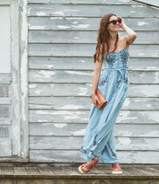 A woman wearing the Bed Stu "Amina" wallet.