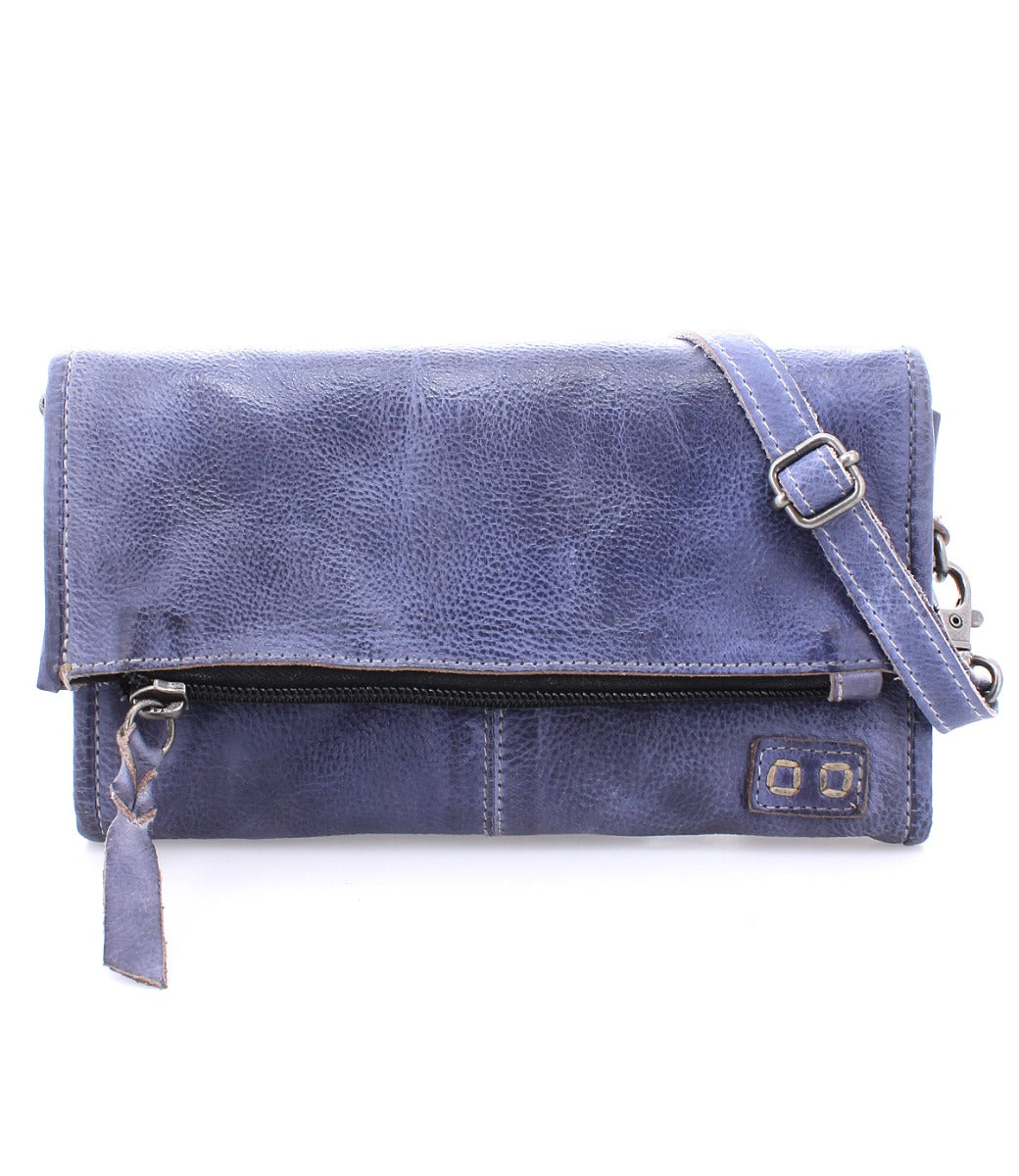 A blue leather Amina clutch bag with an adjustable strap by Bed Stu.