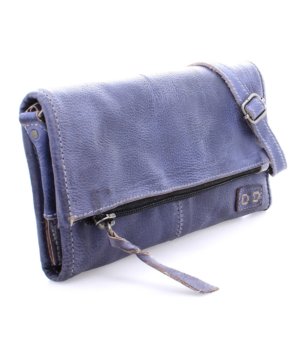 An Amina by Bed Stu blue leather clutch bag with a zipper.