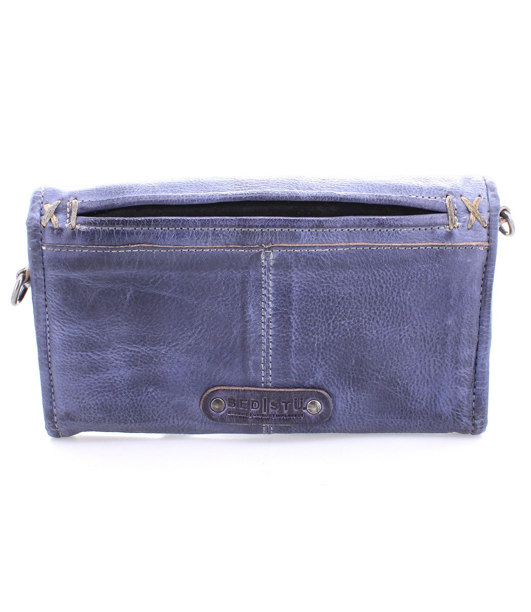 An Amina by Bed Stu blue leather purse with a zipper.