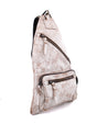 An Andie white leather sling bag on a white background. (Brand: Bed Stu)