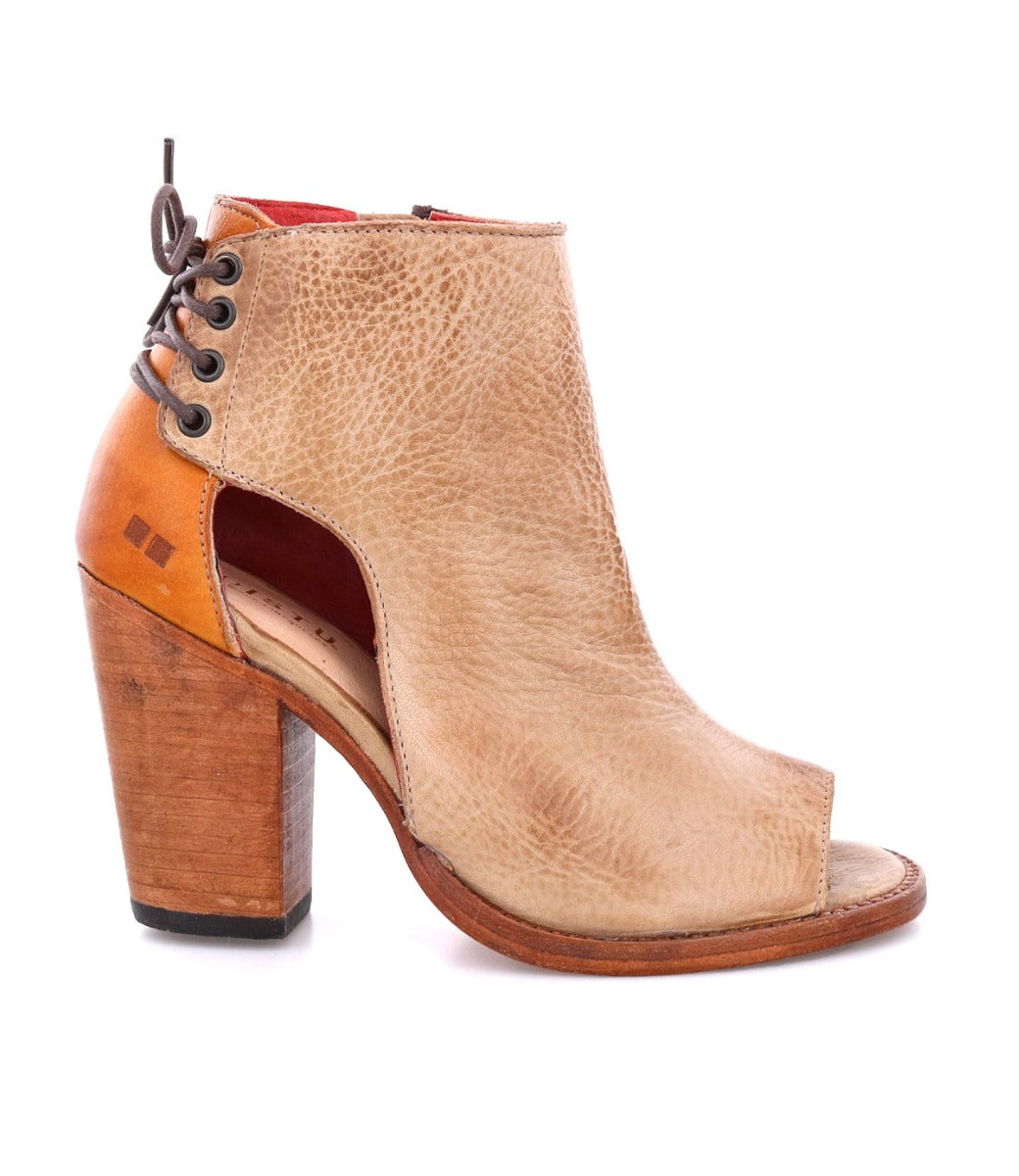 An Angelique women's ankle boot with a wooden heel by Bed Stu.