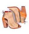 A pair of Angelique ankle boots by Bed Stu with a wooden heel.