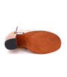 A pair of Bed Stu Angelique women's shoes with tan soles on a white background.